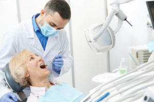 Woman getting a dental checkup, dental cleaning
